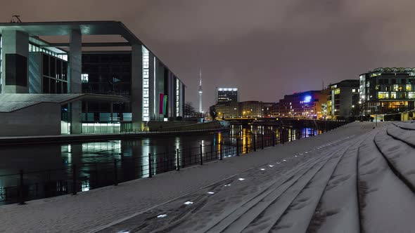 Snowy Night Time Lapse Berlin Cityscape with Spree River, Berlin, Germany alt