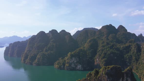 Aerial view landscape view Mountain in lake Refection sky with cloud on lake water. Khaosok Thailand alt