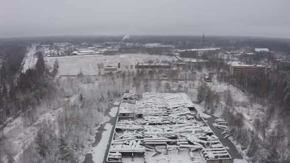 a Destroyed Building As After the War in the Middle of a Forest Landscape in Winter alt