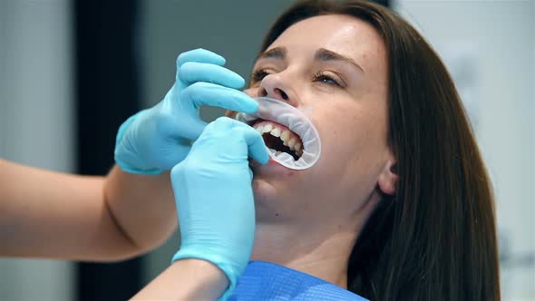 Dentist Puts Oral Ring