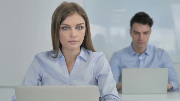 No, Young Businesswoman Rejecting Offer By Waving Finger alt