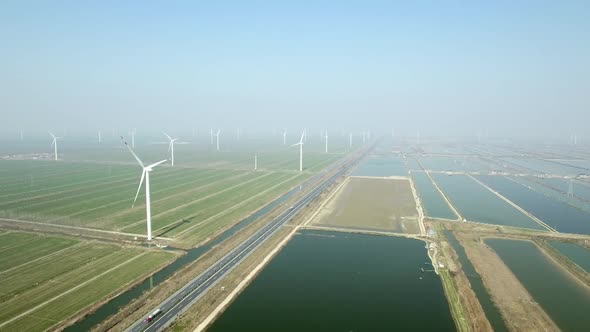 Aerial of wind turbine wind park view from above bird eye alt