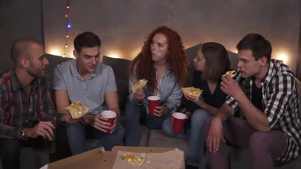 Young People Cheerful Men and Women are Eating Cheesy Pizza Chatting Relaxing During Indoor Party in alt