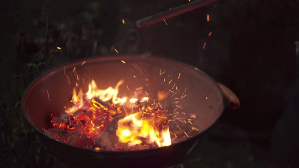 Red and Hot Coals Shimmer Beautifully in the Dark alt