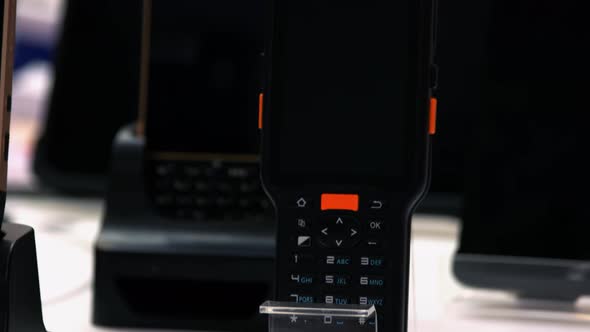 Mobile Phone with Buttons in the Store alt