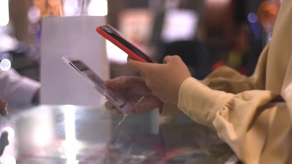 Asian Muslim Woman Using Mobile Phone To Scan QR Code 06