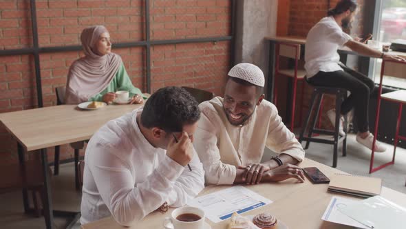 Freelancers Working in Coffee Shop alt
