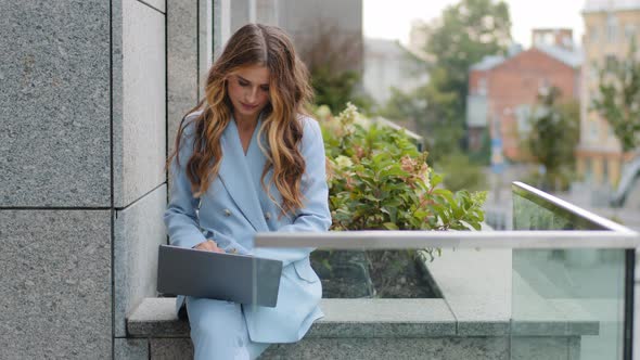 Caucasian Business Woman Young Girl Typing on Laptop Keyboard Sitting on Roof Terrace in City alt