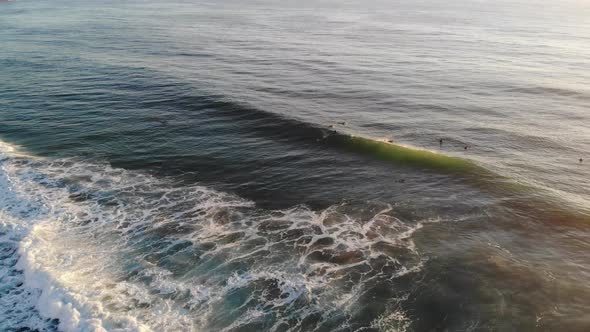 Aerial Of A Surfer Catching A Wave 4 K