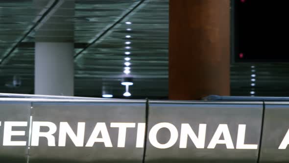 International arrivals sign alt