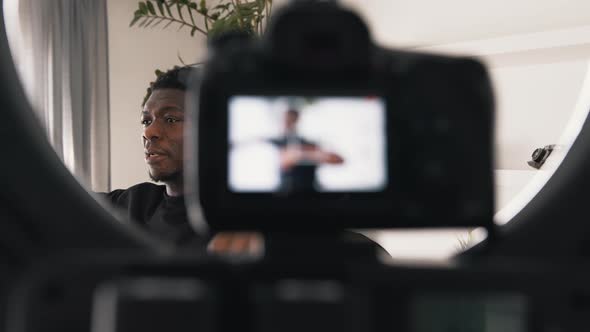 Young Man Personal Trainer Holding Class Online alt