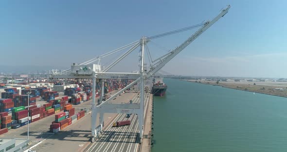 Aerial view of container ships and lifting cranes in the Port of Oakland California alt