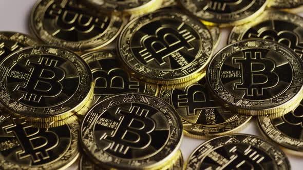 Rotating shot of Bitcoins  alt