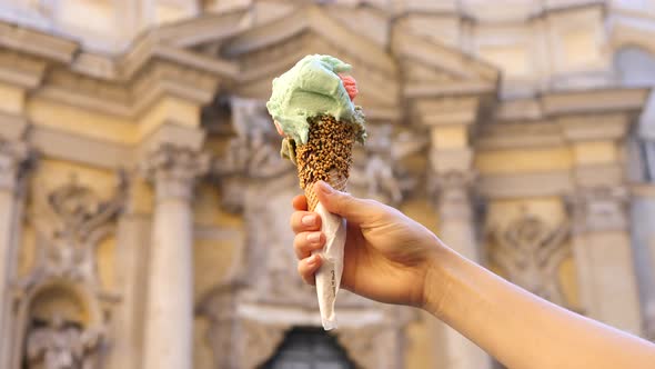 Italian Ice-Cream Cone Held In Hand. Holiday In Rome , Italy. alt