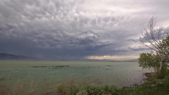 Panning Utah Lake as storm moves over the landscape alt