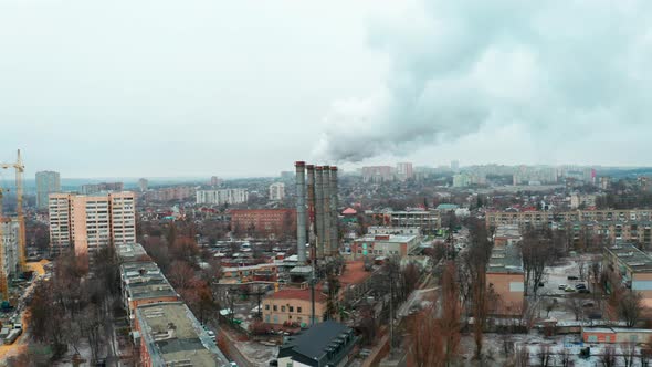 Smoke Pipes of a Thermal Station in an Industrial City in Autumn  Atmosphere Emissions