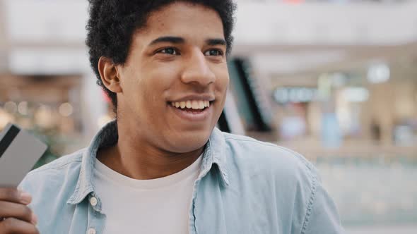 Successful African American Guy Businessman Client of Banking Service Standing Indoor Happy Male alt