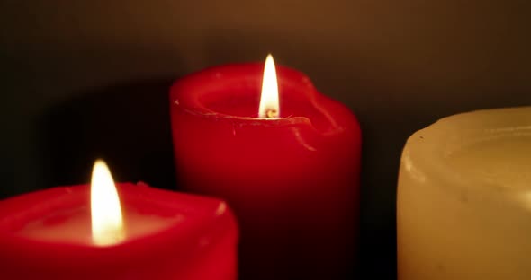 Close-up of candles burning 4k alt