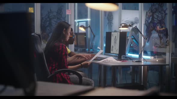 Designers Discussing Video Game Character Creation alt