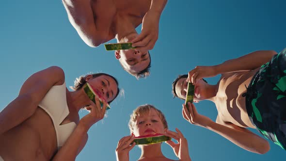 Family Eating Watermelon alt