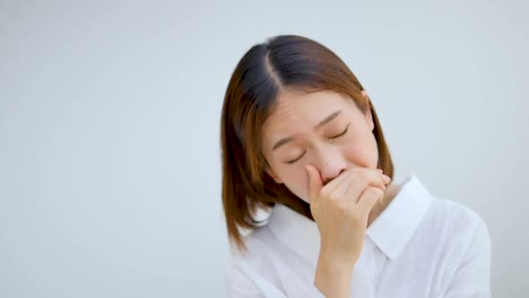 Girl showing sleepy gesture working for a long time