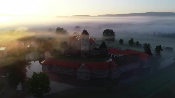 Beautiful Aerial Sunrise View of Castle Svihov - 4K