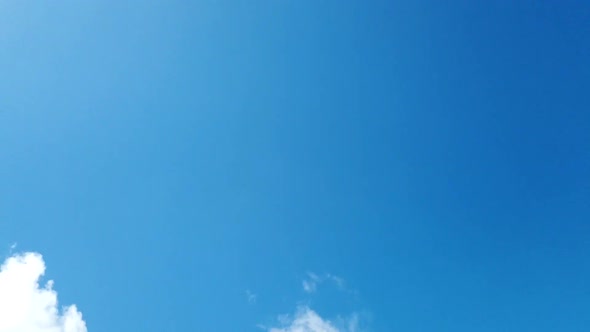 Blue Sky with white clouds alt