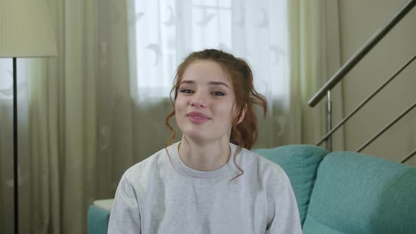 Smiling Young Woman  Vlogger Influencer Sit At Home Speaking Looking At Camera Talking alt