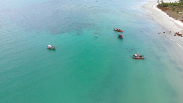 Professional Fishing Boat, Drone Shooting of an Asian Fishing Schooner, Boat with Seaweed on Board alt
