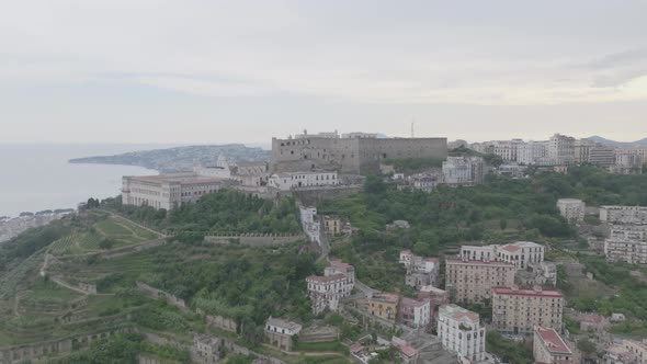 Aerial footage flying towards Castel Sant'Elmo in Naples, Italy. alt
