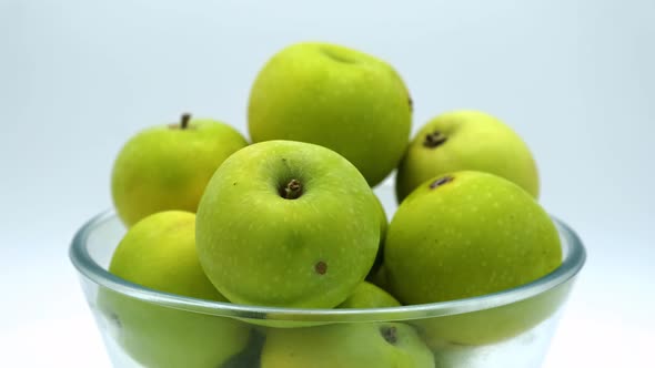 Green apples from the garden on a white background alt
