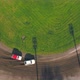 Aerial View on Top Races on the Racetrack. Cars Driving in a Circle Drifting  Around Corners Compete, Vehicles Stock Footage ft. action & architecture -  Envato Elements