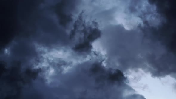 dark rainy cloud moving fast, time-lapse