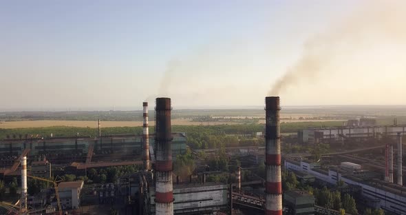 Metallurgical Plant Pollutes The Environment Through Pipes, From A Height Of Flight