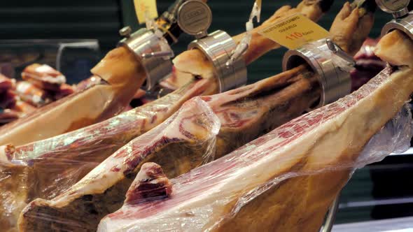 Hanging in a Row Jamon in the Store alt