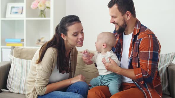 Happy Family with Baby at Home 3 alt