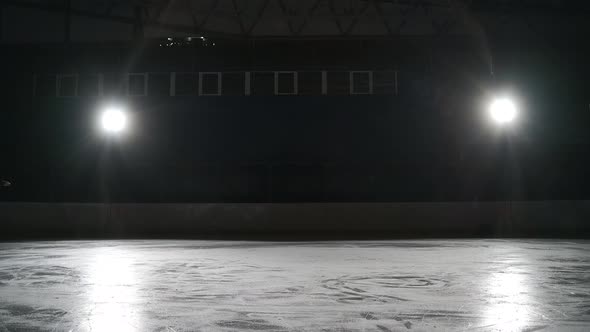 Pair of Young Figure Skaters is Skating Around on Ice Rink Holding Hands Training Program for alt