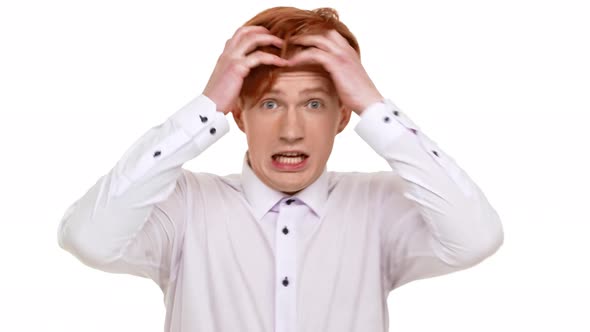 Ginger Handsome Caucasian Young Man Suddenly Get Scared on White Background alt