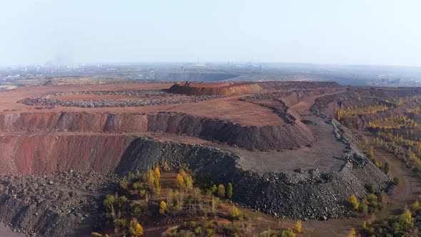 Huge Mounds of Waste Iron Ore Near the Quarry alt