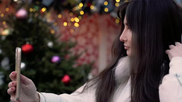 Christmas Ice Rink with a Brunette Girl alt
