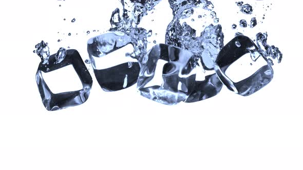 Super Slow Motion Shot of Ice Cubes Falling Into Water at 1000Fps alt
