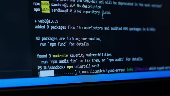 Developer looks at HTML code on a computer screen. HTML web pages scroll code programming