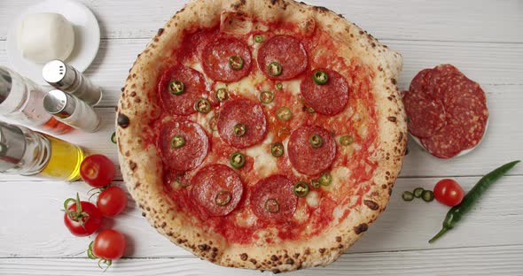 Fresh Out of the Oven Pepperoni Pizza Ready for Eating alt