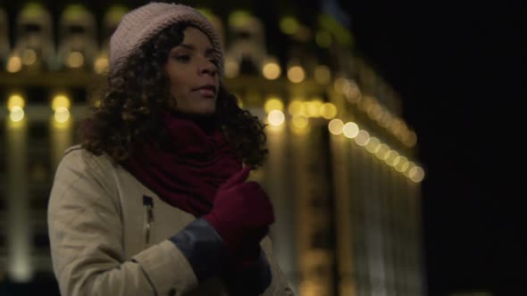 Lady Peering Into Distance and Looking Around, Waiting for Her Boyfriend alt