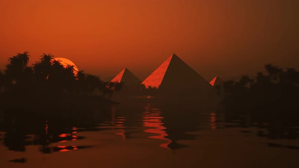 Timelapse of the sunset over the lake and ancient pyramids on the horizon. alt