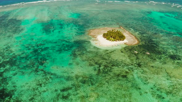 Tropical Guyam Island with a Sandy Beach and Tourists alt