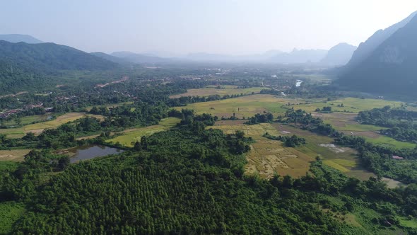 Natural landscapes around the city of Vang Vieng in Laos seen from the sky alt