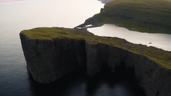 Aerial drone video flying over of Sorvagsvatn lake