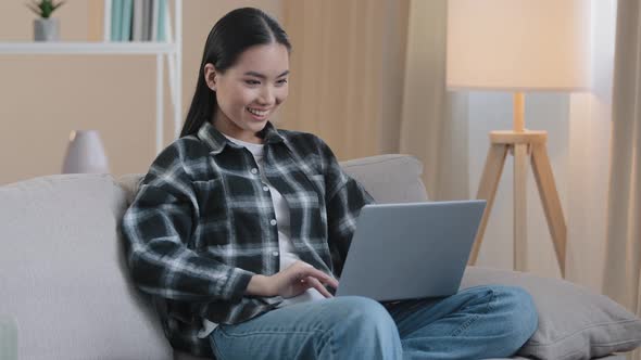 Asian 20s Girl User Millennial Female Student Freelancer Woman Chatting Internet with Laptop Home alt