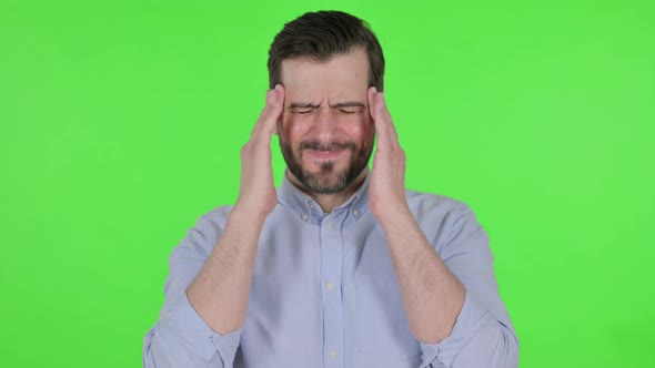 Portrait of Man Having Headache Green Screen alt